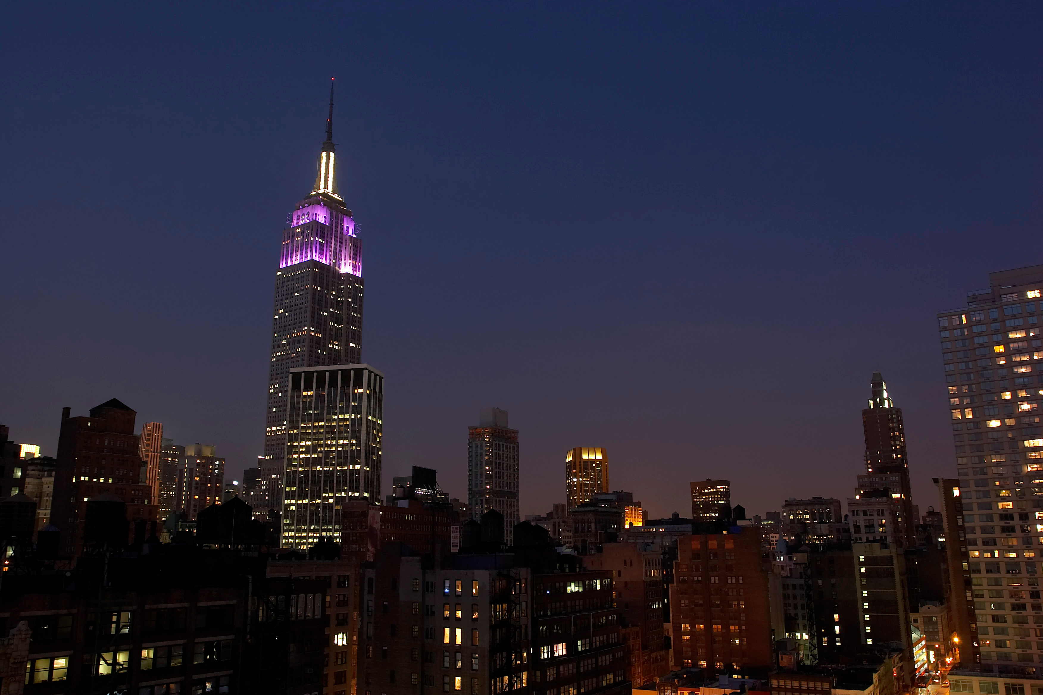 Empire State Building lit up purple for NYU